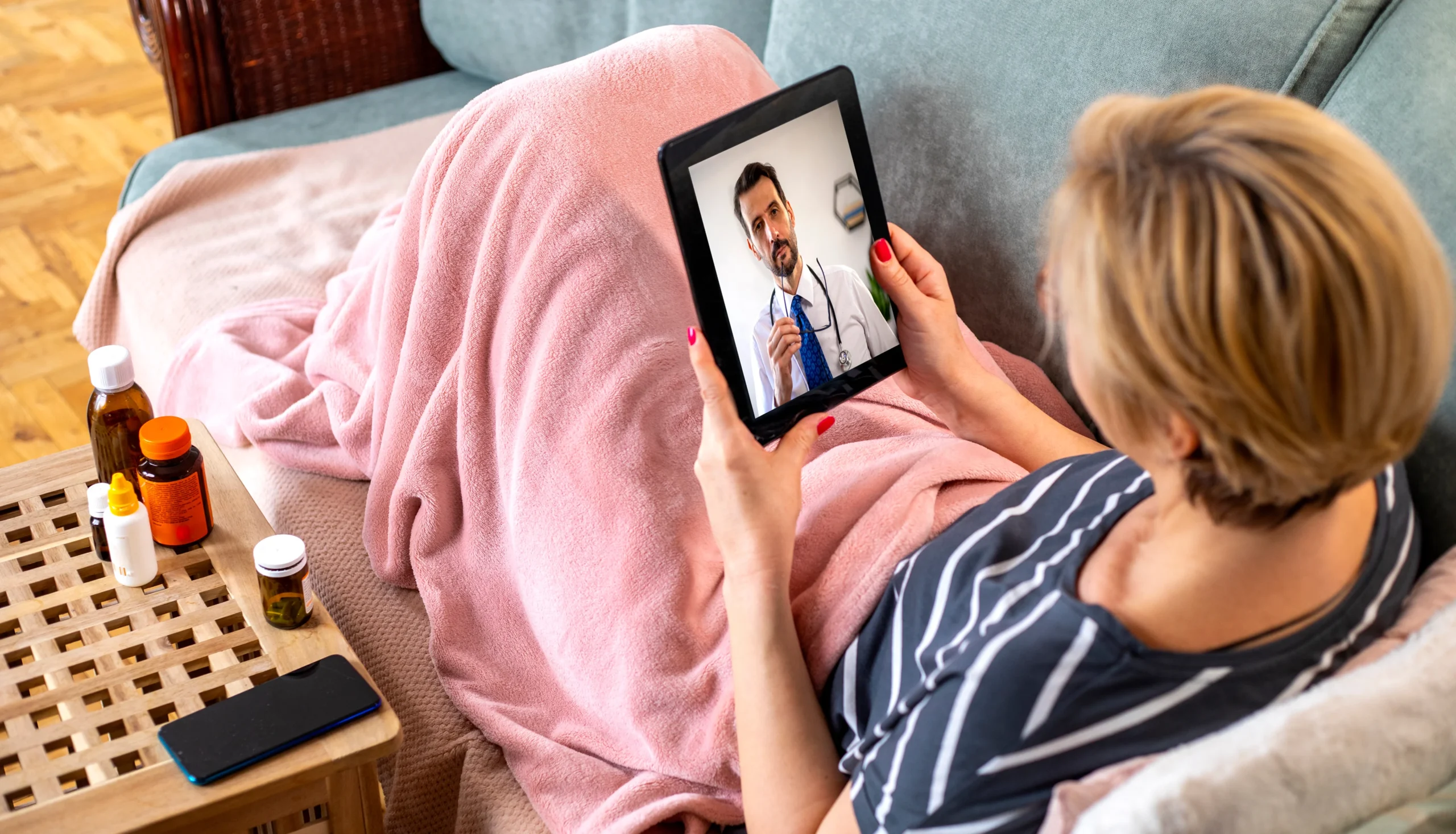 Woman having virtual consultation with doctor