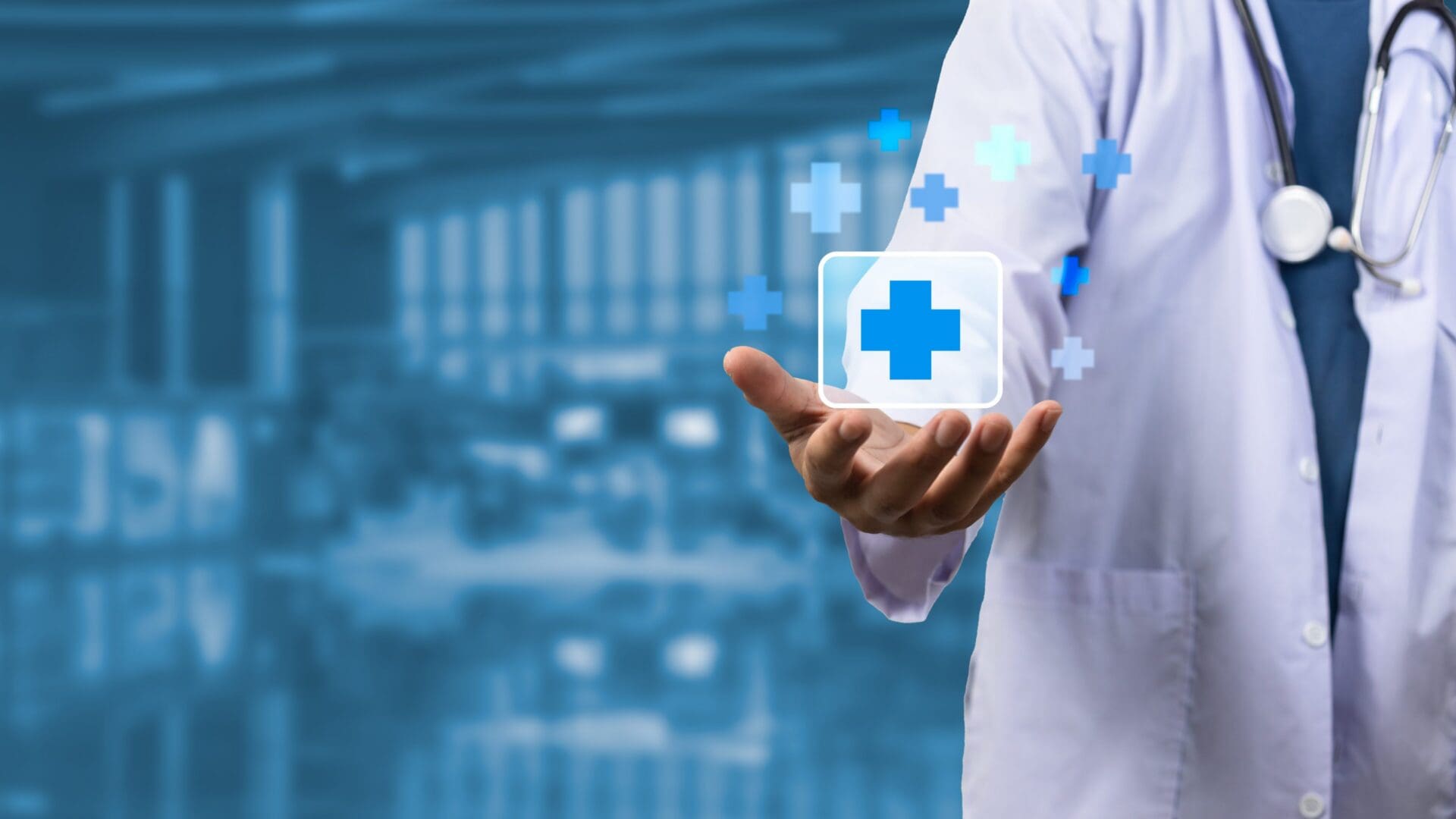 Doctor holding digital medical cross icons